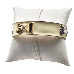Vintage Gold Tone Metal Bangle Bracelet Clear Rhinestone Bow Accents
